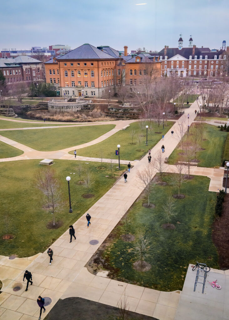 Students cross the Bardeen Quad as the spring semester kicks off as students return to classes at the University of Illinois Urbana-Champaign.
